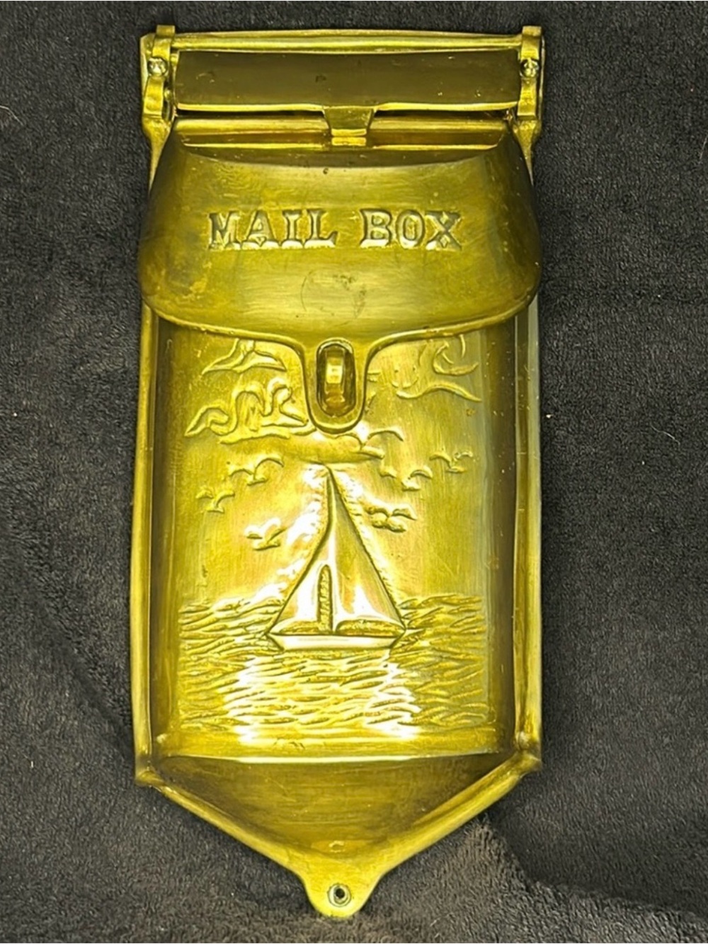 Nautical Mailbox. Brass,Nautical scene on the front. Has hasp for lock/security.